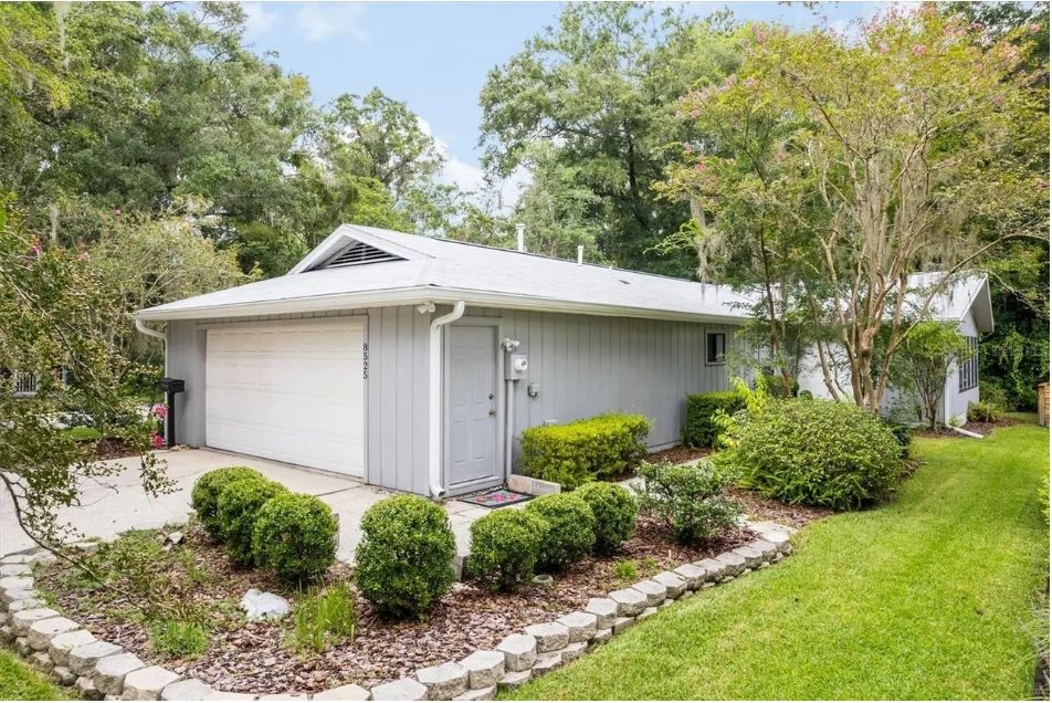 Gray Home with Renovated Kitchen and Stacked-Stone Fireplace, interior or exterior detail view